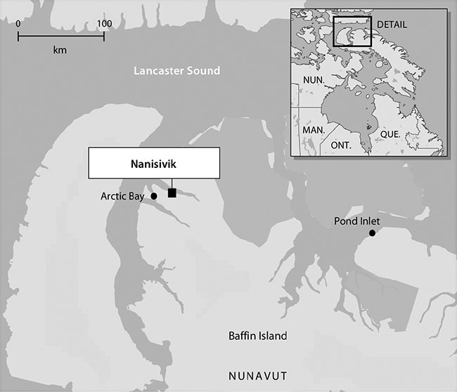 A map of Arctic Bay and Nanisivik. An enlarged detail in the upper right-hand corner shows the area of the former Nanisivik settlement on the shore of Strathcona Sound at the northern tip of Baffin Island. The settlement has since been demolished and the Nanisivik lead-zinc mine closed.